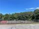 Community tennis courts, perfect for recreational play at 2436 Moultrie Ct, Dacula, GA 30019