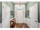 Welcoming foyer with hardwood floors, neutral paint, and ample natural light at 352 Southgate Dr, Locust Grove, GA 30248