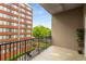 Private balcony overlooking manicured landscaping and cityscape views from the apartment at 384 Ralph Mcgill Ne Blvd # 318, Atlanta, GA 30312