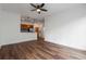 Spacious open concept living area featuring hardwood floors and a modern kitchen with stainless steel appliances at 384 Ralph Mcgill Ne Blvd # 318, Atlanta, GA 30312