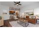 Bright living room featuring modern furnishings, hardwood floors and an open floor plan with a view into the kitchen at 384 Ralph Mcgill Ne Blvd # 318, Atlanta, GA 30312