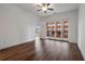 Bright main bedroom featuring hardwood floors, and large doors opening to a balcony with city views at 384 Ralph Mcgill Ne Blvd # 318, Atlanta, GA 30312