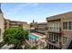 Inviting swimming pool, surrounded by lounge chairs, within modern condo community at 384 Ralph Mcgill Ne Blvd # 318, Atlanta, GA 30312