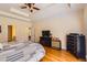 Spacious main bedroom featuring hardwood floors and tray ceilings at 595 Mcgarity Dr, Mcdonough, GA 30252