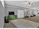 Finished basement featuring carpet and a green dresser at 2582 Oak Bluff Dr, Dacula, GA 30019