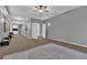 Spacious finished basement with carpet and doorways to other rooms at 2582 Oak Bluff Dr, Dacula, GA 30019