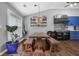 Rustic dining area with a wooden table, benches, and open access to the modern kitchen at 2582 Oak Bluff Dr, Dacula, GA 30019