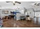 Bright and open living room with hardwood flooring, offering versatile living and dining spaces at 2582 Oak Bluff Dr, Dacula, GA 30019
