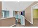 Upstairs hallway with railing, hardwood floors, and natural light at 5008 Bethpage Dr, Suwanee, GA 30024