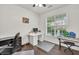 Bright office space with natural light, featuring modern furniture and neutral decor for a productive work environment at 5008 Bethpage Dr, Suwanee, GA 30024