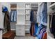 Walk-in closet with built-in shelving, drawers, and rods offering plenty of storage space at 120 Nezhat Pl, Atlanta, GA 30350
