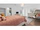 Bedroom with a plush bed, a desk, and hardwood floors at 120 Nezhat Pl, Sandy Springs, GA 30350