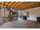 Wooden deck featuring a spiral staircase and brick support columns at 120 Nezhat Pl, Sandy Springs, GA 30350