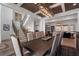 An open concept view of the dining room, staircase and living room are captured here at 120 Nezhat Pl, Sandy Springs, GA 30350