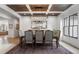 Charming dining room featuring coffered ceilings, a chandelier, and seating for six at 120 Nezhat Pl, Sandy Springs, GA 30350