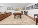 Spacious game room with a pool table, seating area, and stylish decor at 120 Nezhat Pl, Sandy Springs, GA 30350
