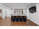 Modern kitchen with large island, stylish bar stools, and open layout at 120 Nezhat Pl, Sandy Springs, GA 30350