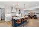 View of kitchen with stainless appliances, island seating, and open layout at 120 Nezhat Pl, Sandy Springs, GA 30350