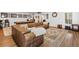 Inviting living room featuring a pool table, comfortable seating, and stylish decor at 120 Nezhat Pl, Sandy Springs, GA 30350