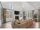 Inviting living room with vaulted ceilings, fireplace, and generous seating at 120 Nezhat Pl, Sandy Springs, GA 30350