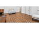 Large main bedroom with light hardwood floors, a neutral color palette, and lots of natural light at 120 Nezhat Pl, Sandy Springs, GA 30350