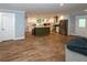 Open floor plan featuring a spacious kitchen with stainless appliances and a large island at 1563 Brannon Sw Cir, Austell, GA 30106