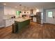 Bright kitchen with white cabinets, granite countertops, stainless appliances, and a center island at 1563 Brannon Sw Cir, Austell, GA 30106