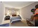Comfortable bedroom featuring neutral tones, decorative accents, and ample natural light at 2632 Peachtree Nw Rd # 203B, Atlanta, GA 30305
