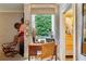 Charming home office with a view, built-in drawers, and a comfortable chair at 2632 Peachtree Nw Rd # 203B, Atlanta, GA 30305