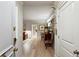 Bright hallway view showcasing hardwood floors, leading to a stylishly decorated living space at 2632 Peachtree Nw Rd # 203B, Atlanta, GA 30305