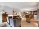 Comfortable living room with neutral tones, built-in bookshelves, and stylish furniture arrangement at 2632 Peachtree Nw Rd # 203B, Atlanta, GA 30305