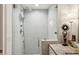 Contemporary walk-in shower featuring a glass door, rainfall showerhead, and elegant fixtures at 2632 Peachtree Nw Rd # 203B, Atlanta, GA 30305