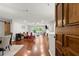 Inviting living room with open layout, wood floors, a sliding barn door, and ample natural light at 305 Ridley Howard Ct, Decatur, GA 30030