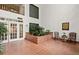Welcoming lobby area with tile flooring, indoor plants, and comfortable seating at 305 Ridley Howard Ct, Decatur, GA 30030