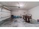 Spacious garage with epoxy floor, laundry area, and foosball table for entertainment at 4100 Springlake Cir, Buford, GA 30519