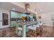 Well-equipped kitchen featuring a large island with bar seating, offering functionality at 4100 Springlake Cir, Buford, GA 30519