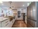 Modern kitchen featuring granite countertops, stainless steel appliances, and hardwood floors at 4100 Springlake Cir, Buford, GA 30519