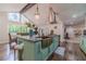Spacious kitchen with breakfast bar, ample counter space, and hardwood floors at 4100 Springlake Cir, Buford, GA 30519