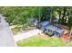 Charming renovated two-story home with new driveway, orange doors, and manicured lawn at 805 Wayside Dr, Lawrenceville, GA 30046