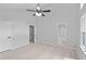 Spacious main bedroom with plank flooring and high ceiling at 805 Wayside Dr, Lawrenceville, GA 30046