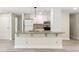 Kitchen with a granite island and updated appliances at 1030 Brockdell Ct, Norcross, GA 30093