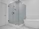 Elegant bathroom featuring a glass shower and a soaking tub at 1110 Harper Dr, Roswell, GA 30076