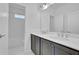 Beautiful bathroom with double vanity, subway tile shower, and modern fixtures at 1110 Harper Dr, Roswell, GA 30076