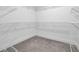 Spacious walk-in closet with shelving offers ample storage space at 1110 Harper Dr, Roswell, GA 30076