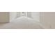 Large bedroom featuring neutral carpet and a large doorway to welcome natural light at 1250 Parkview Nw Ln, Kennesaw, GA 30152