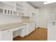 Bright area in the kitchen offers built-in desk, storage and hardwood flooring at 1250 Parkview Nw Ln, Kennesaw, GA 30152