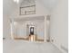 Open-concept living room with high ceilings and access to staircase at 1250 Parkview Nw Ln, Kennesaw, GA 30152