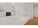 Bright living room featuring a fireplace, large windows, and soaring ceilings at 1250 Parkview Nw Ln, Kennesaw, GA 30152