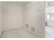 Spacious walk-in closet with carpet flooring and white shelving for optimal organization at 1250 Parkview Nw Ln, Kennesaw, GA 30152