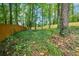An abundant green space with mature trees and views of the backyard at 1508 Walker Ridge Sw Dr, Marietta, GA 30064